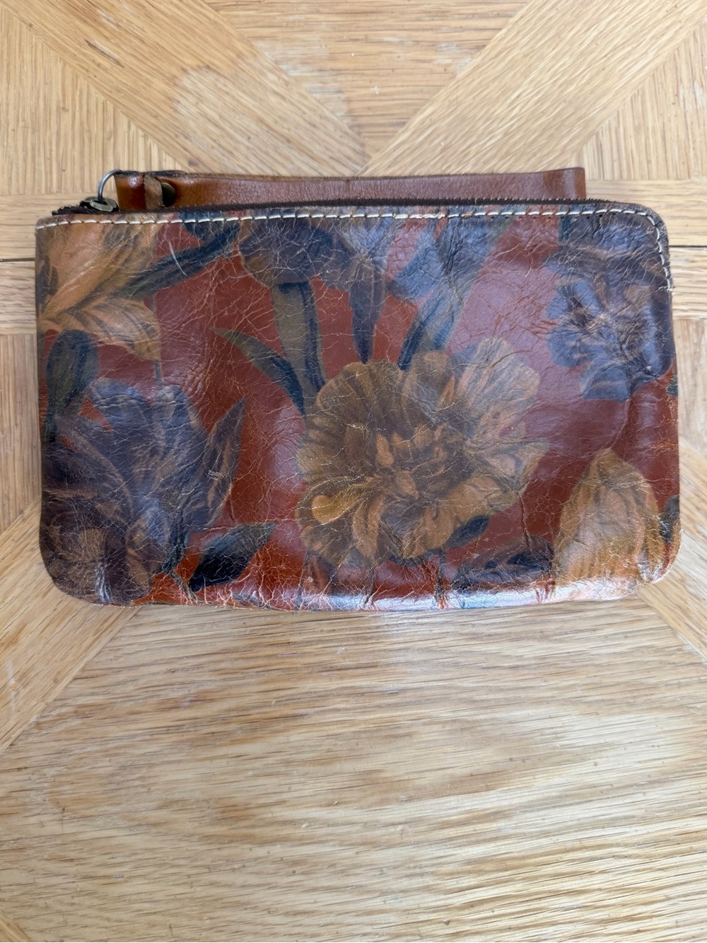 Floral Leather Zip Wristlet in Brown and Gold Tones